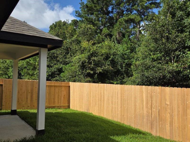 Exterior details and patio area of a home in River's Edge, Conroe (Image 3).