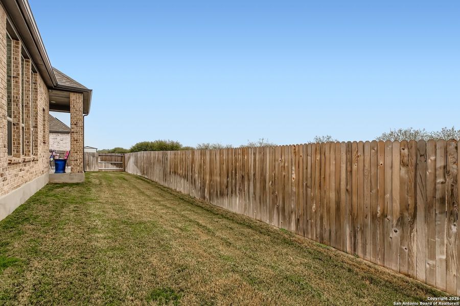 Exterior details and patio area of a home in Mesa Western, Cibolo (Image 24).