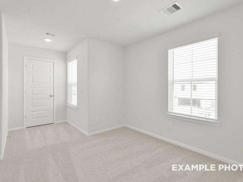 Spacious, unfurnished interior of a new home in Caney Creek Place, Conroe (Image 33).