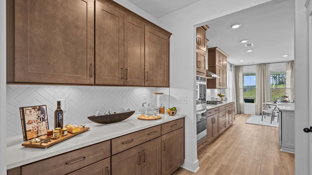 Furnished interior view inside a new home in Kayfield at Midway, Anderson (Image 6).