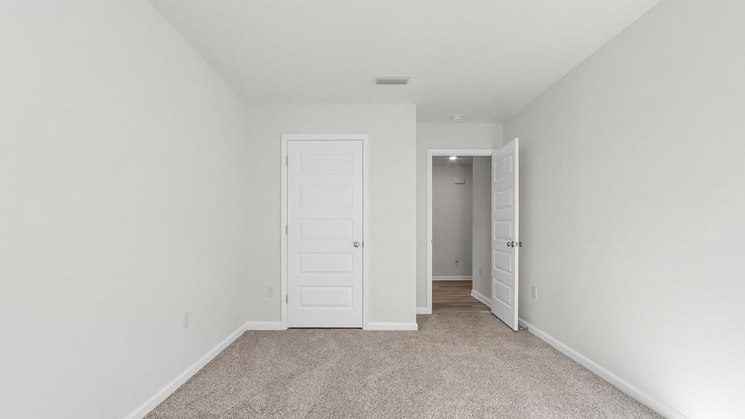 Spacious, unfurnished interior of a new home in Ashton Park Phase III, Freeport (Image 23).