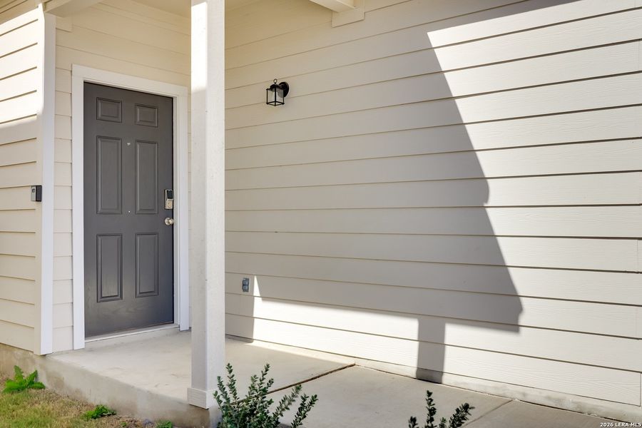 Exterior details and patio area of a home in Melissa Ranch, San Antonio (Image 23).