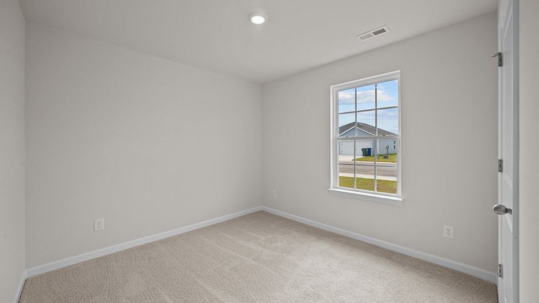 Spacious, unfurnished interior of a new home in Hobbs Farm, Ayden (Image 11).