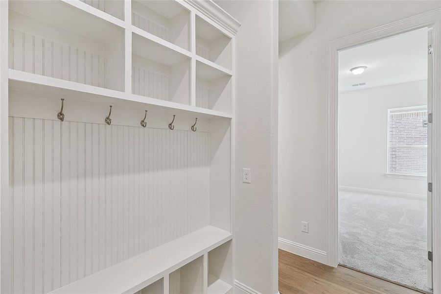 Mudroom featuring hardwood / wood-style floors