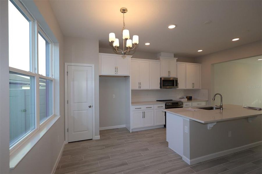 Furnished interior view inside a new home in Center Lake on the Park, St. Cloud (Image 9). Furnished interior view inside a new home in Center Lake on the Park, St. Cloud (Image 9).