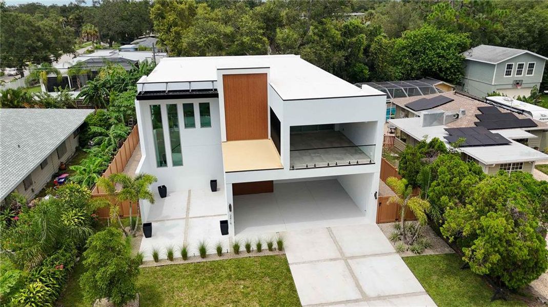 Front exterior of a new home in , Sarasota, FL, highlighting curb appeal (Image 27).