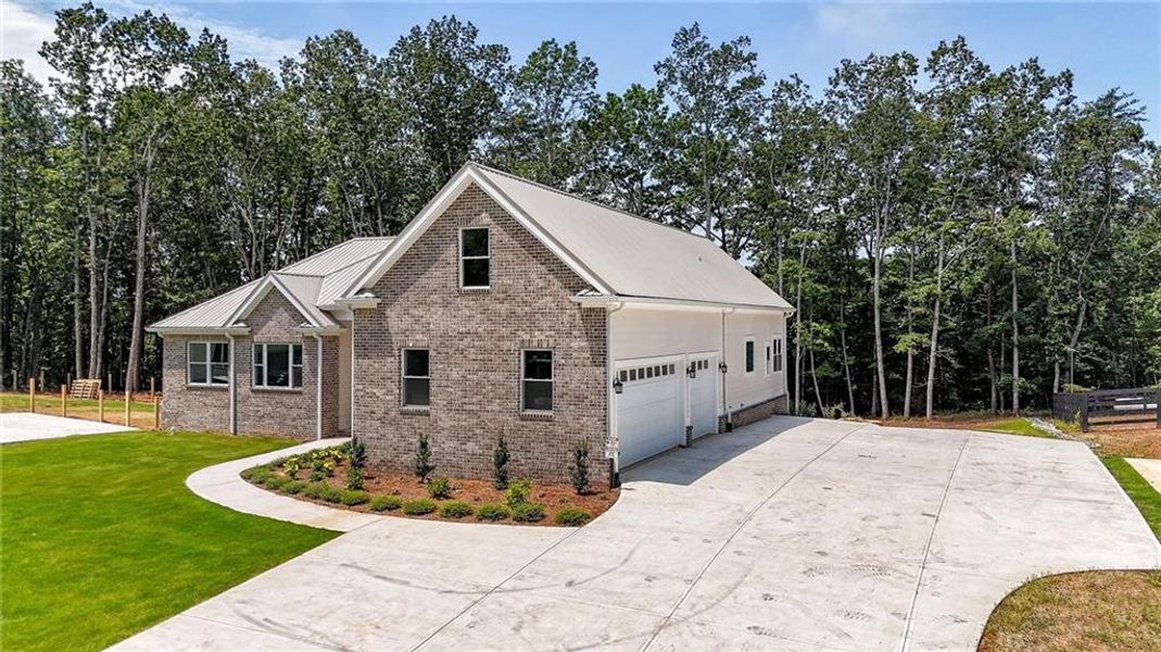 Front exterior of a new home in , Canton, GA, highlighting curb appeal (Image 24).