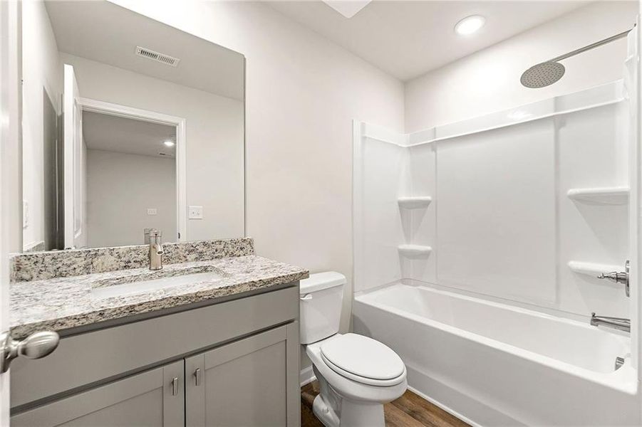 Furnished interior view inside a new home in The Grove At Mundy Mill, Gainesville (Image 9). Furnished interior view inside a new home in The Grove At Mundy Mill, Gainesville (Image 9).