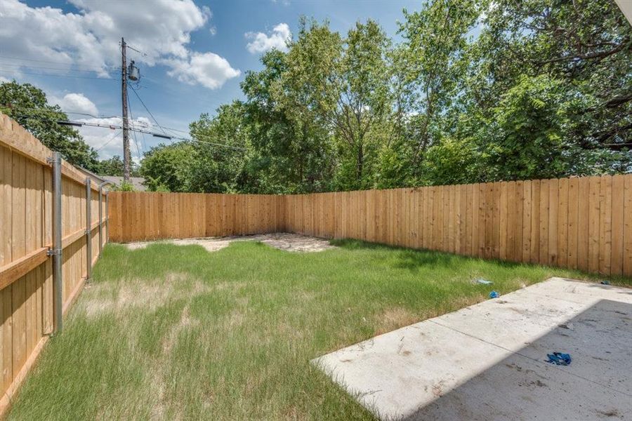 View of yard with a patio area