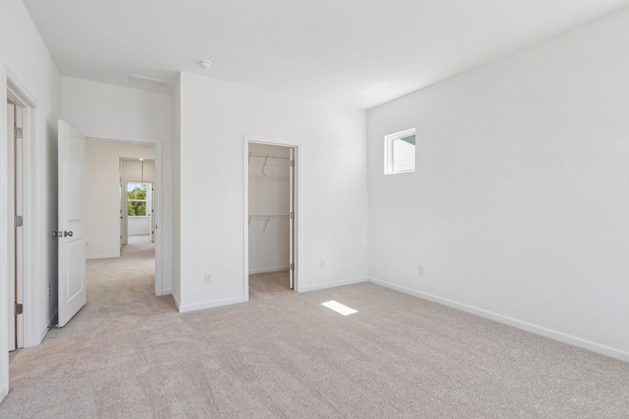 Spacious, unfurnished interior of a new home in Terraces at the Exchange, Indian Land (Image 24).