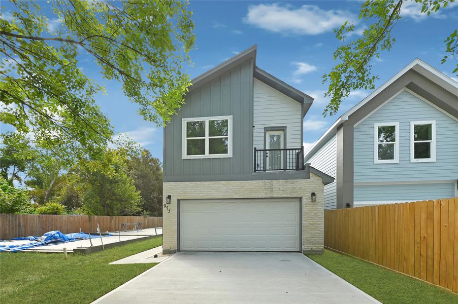 Striking two-story home with charming curb appeal and clean modern lines. Striking two-story home with charming curb appeal and clean modern lines.