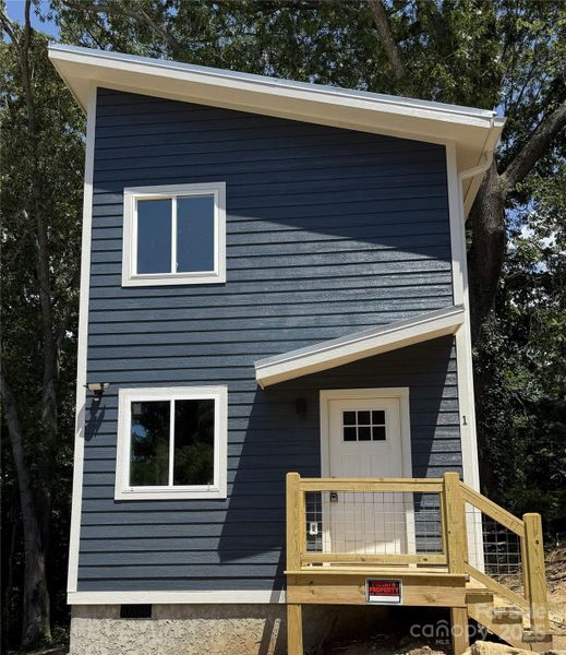 Exterior details and patio area of a home in , Asheville (Image 2). Exterior details and patio area of a home in , Asheville (Image 2).