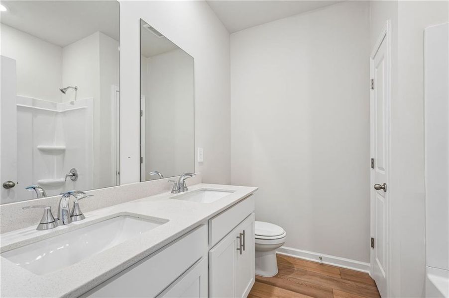 Furnished interior view inside a new home in Northwoods at Mirror Lake, Villa Rica (Image 18).