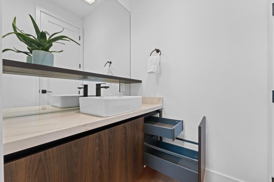 Sleek storage solutions and under-cabinet lighting bring function and beauty together. Sleek storage solutions and under-cabinet lighting bring function and beauty together.