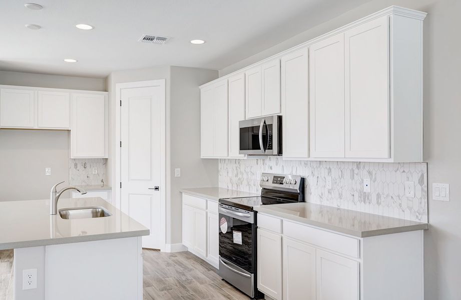 Representative furnished interior of a home built from the Castillo Series - Clover by Brightland Homes in Castillo at Anderson Parc, Buckeye (Image 16). Representative furnished interior of a home built from the Castillo Series - Clover by Brightland Homes in Castillo at Anderson Parc, Buckeye (Image 16).