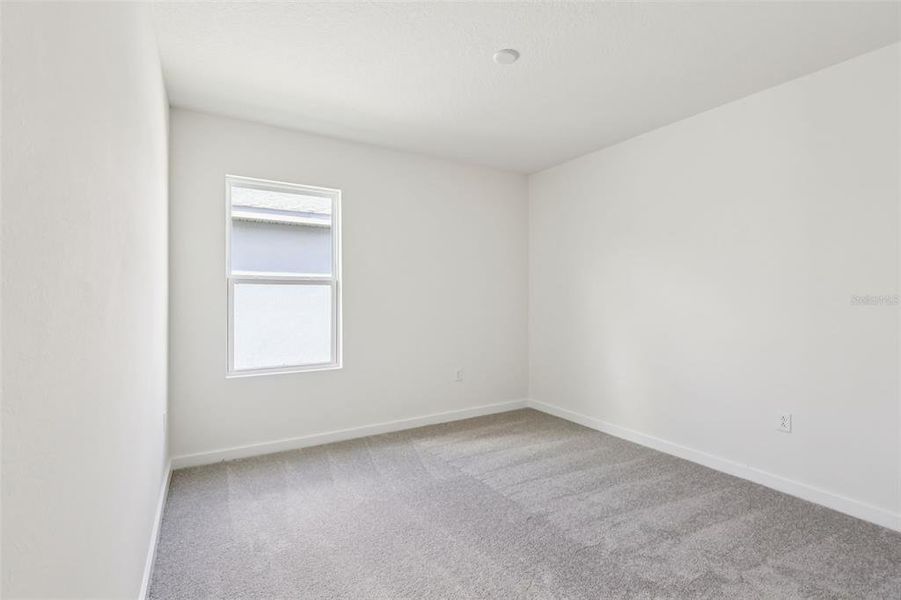 Spacious, unfurnished interior of a new home in Willowbrook North, Winter Haven (Image 26).