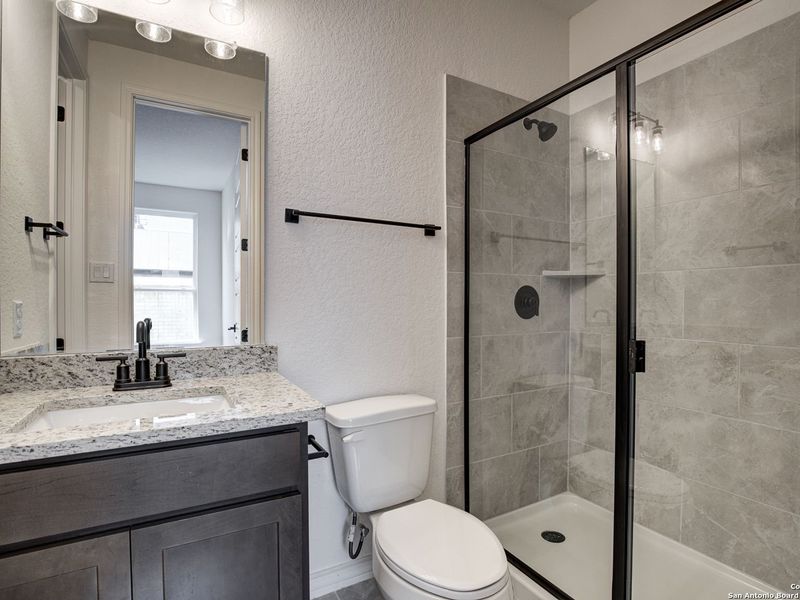 Furnished interior view inside a new home in The Reserve at Potranco Oaks, Castroville (Image 16).