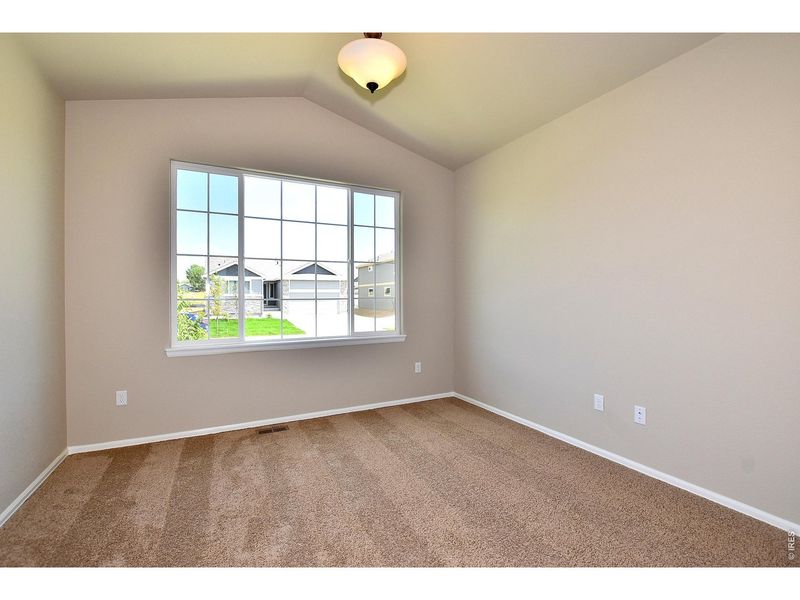 Spacious, unfurnished interior of a new home in Union Colony West, Greeley (Image 22).