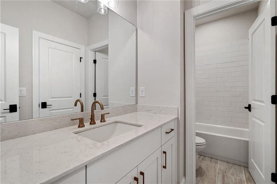 Furnished interior view inside a new home in Ward's Crossing Townhomes, Johns Creek (Image 9).