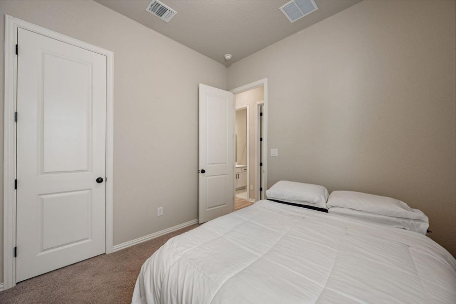 Furnished interior view inside a new home in Heritage, Dripping Springs (Image 17).