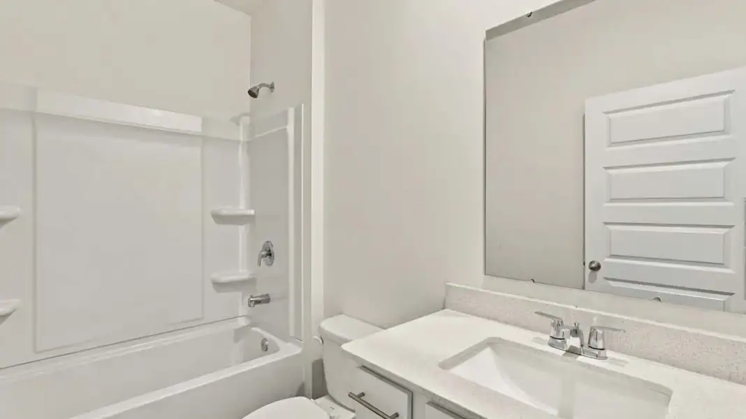 Furnished interior view inside a new home in The Lakes at North Glynn, Brunswick (Image 11).