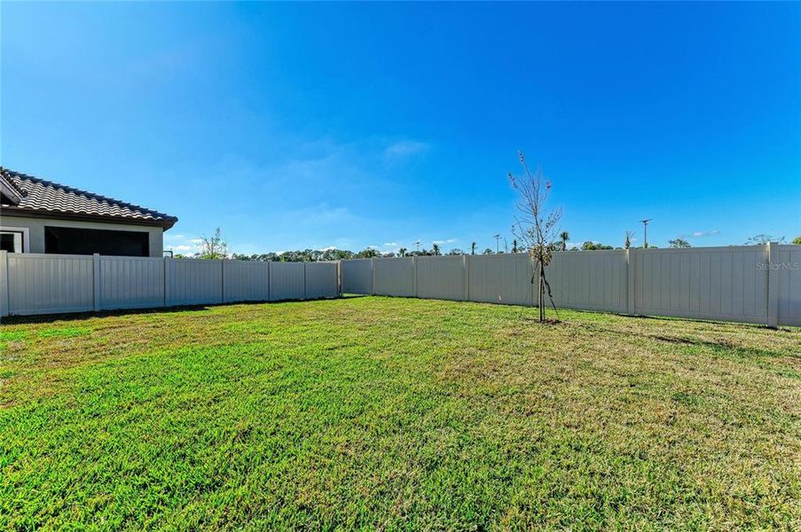 Exterior details and patio area of a home in Crosswind Ranch, Parrish (Image 22).