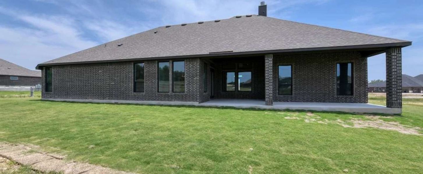 Representative exterior photo of a completed home built from the Cayden by Ashton Woods in Waldsanger, New Braunfels, TX (Image 15). Representative exterior photo of a completed home built from the Cayden by Ashton Woods in Waldsanger, New Braunfels, TX (Image 15).