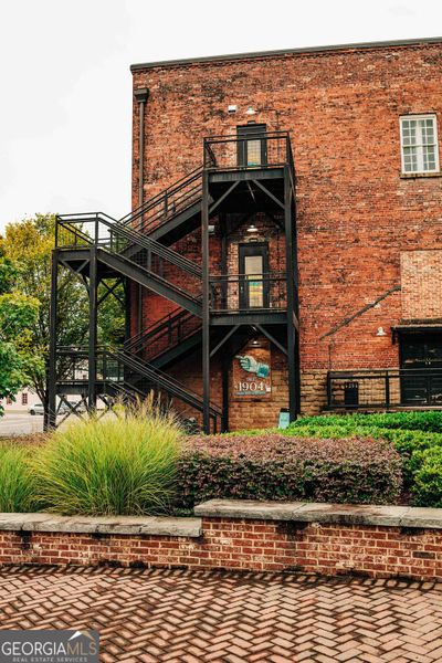 Front exterior of a new home in Rosewood Lake Estates, Hoschton, GA, highlighting curb appeal (Image 23).