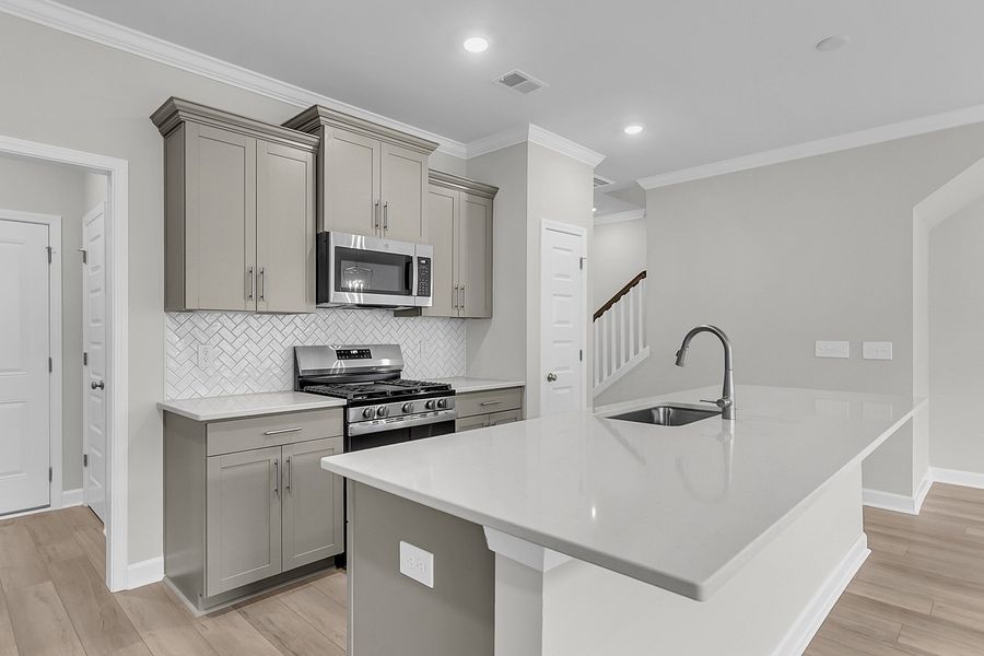 Furnished interior view inside a new home in Pineland Preserve, Summerville (Image 9).