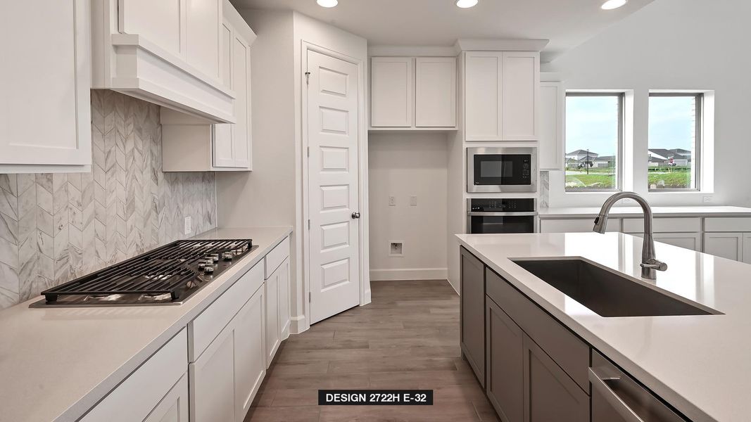 Kitchen with stainless steel appliances, recessed lighting, light countertops, premium range hood, and wood finished floors