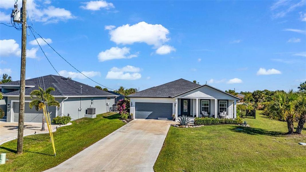 Front exterior of a new home in , Rotonda West, FL, highlighting curb appeal (Image 22). Front exterior of a new home in , Rotonda West, FL, highlighting curb appeal (Image 22).