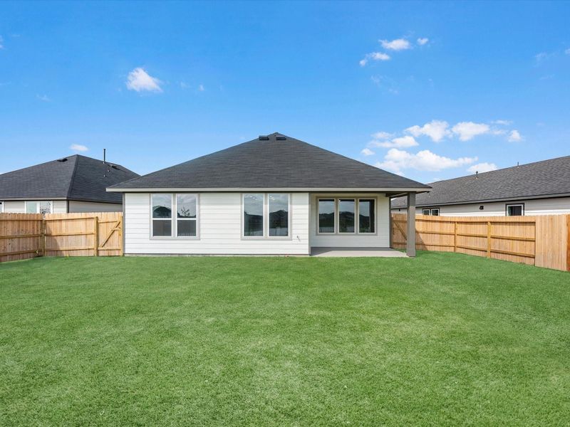 Exterior details and patio area of a home in Mason Woods, Cypress (Image 3).