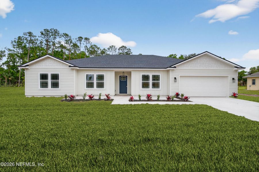 Front exterior of a new home in , Middleburg, FL, highlighting curb appeal (Image 1). Front exterior of a new home in , Middleburg, FL, highlighting curb appeal (Image 1).