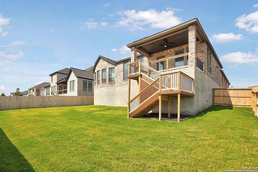 Exterior details and patio area of a home in Kinder Ranch 70's, San Antonio (Image 24).