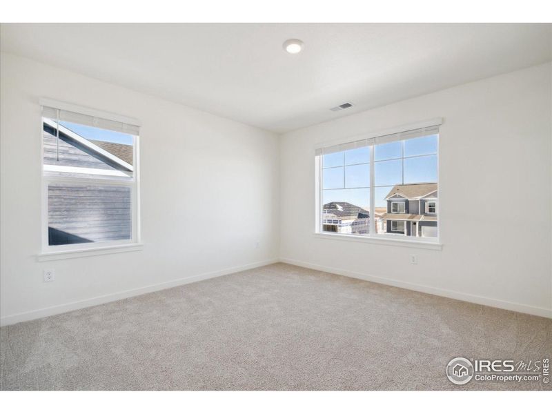 Spacious, unfurnished interior of a new home in Westgate, Greeley (Image 14).