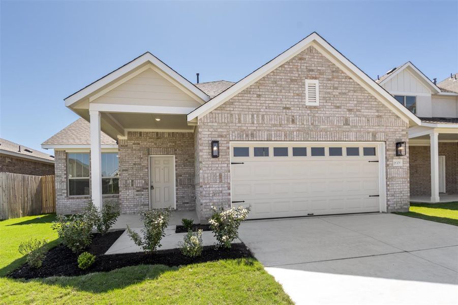 View of front of house featuring a front yard, fence, brick siding, an attached garage, and concrete driveway View of front of house featuring a front yard, fence, brick siding, an attached garage, and concrete driveway