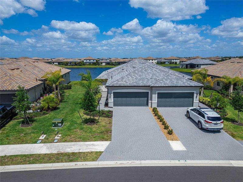Front exterior of a new home in , Bradenton, FL, highlighting curb appeal (Image 26).