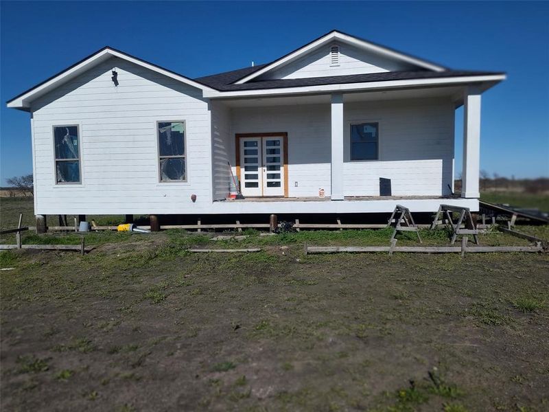 Exterior details and patio area of a home in , Barry (Image 3).