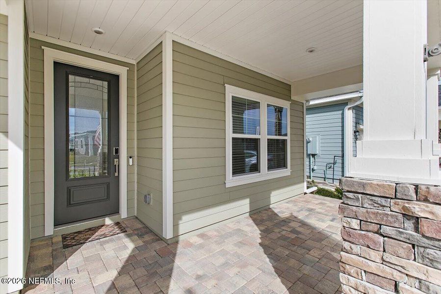 Exterior details and patio area of a home in Silver Meadows at SilverLeaf, St. Augustine (Image 20).