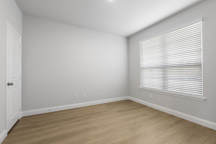 Representative unfurnished interior of a home built from the Garrison I by Cheldan Homes in Stoneview, Glen Rose (Image 20).