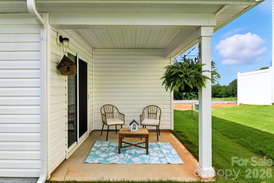 Exterior details and patio area of a home in Trivium, Newton (Image 4).