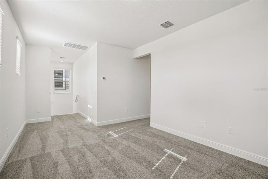 Spacious, unfurnished interior of a new home in Cyrene at Minneola - Villas, Minneola (Image 30).