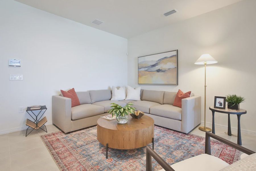 Representative furnished interior of a home built from the Morgan by Neal Communities in SkySail, Naples (Image 27).