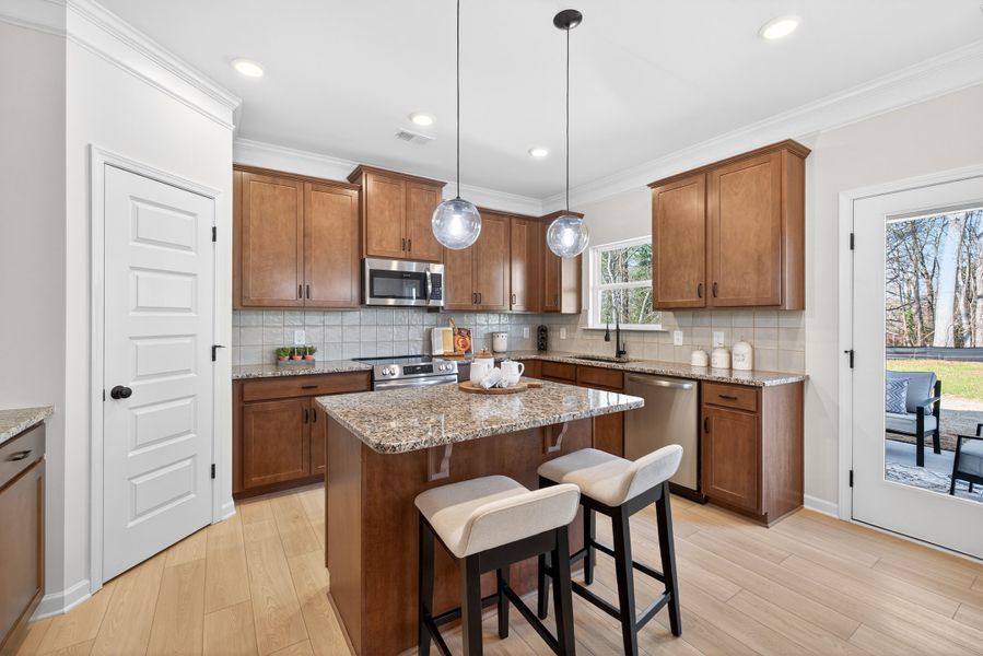 Furnished interior view inside a new home in Summerfield Place, Carrollton (Image 5).
