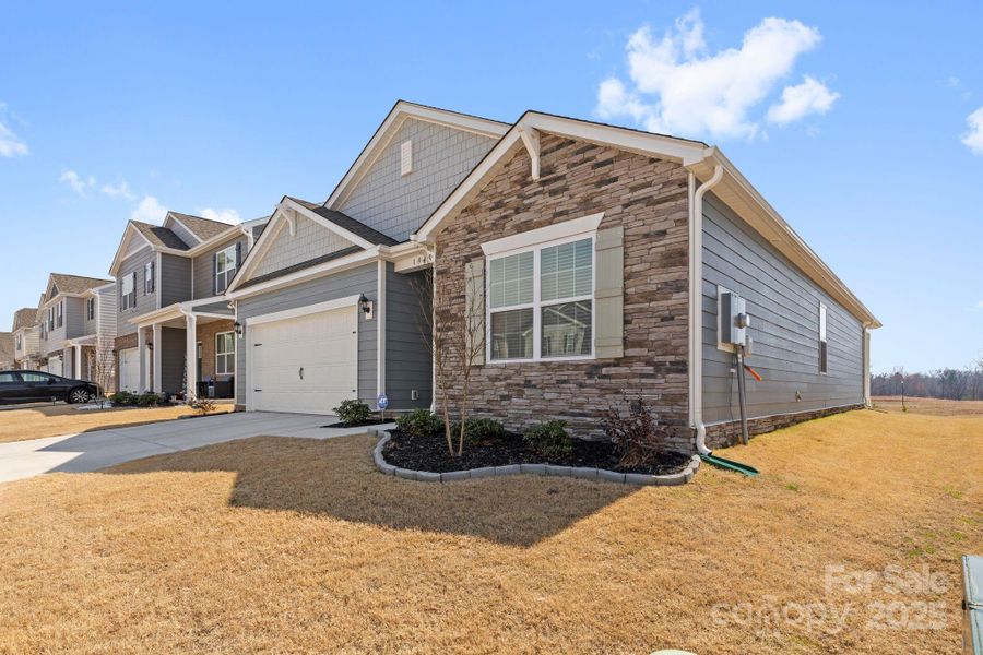 Front exterior of a new home in Secrest Commons, Monroe, NC, highlighting curb appeal (Image 19).