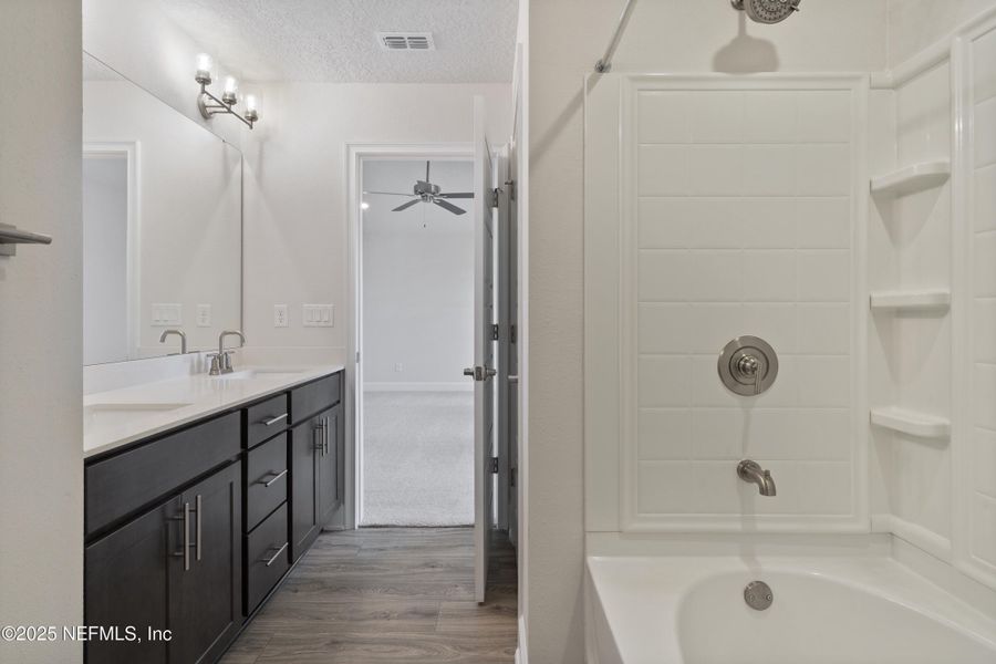 Furnished interior view inside a new home in Shadow Crest at Rolling Hills, Green Cove Springs (Image 8). Furnished interior view inside a new home in Shadow Crest at Rolling Hills, Green Cove Springs (Image 8).
