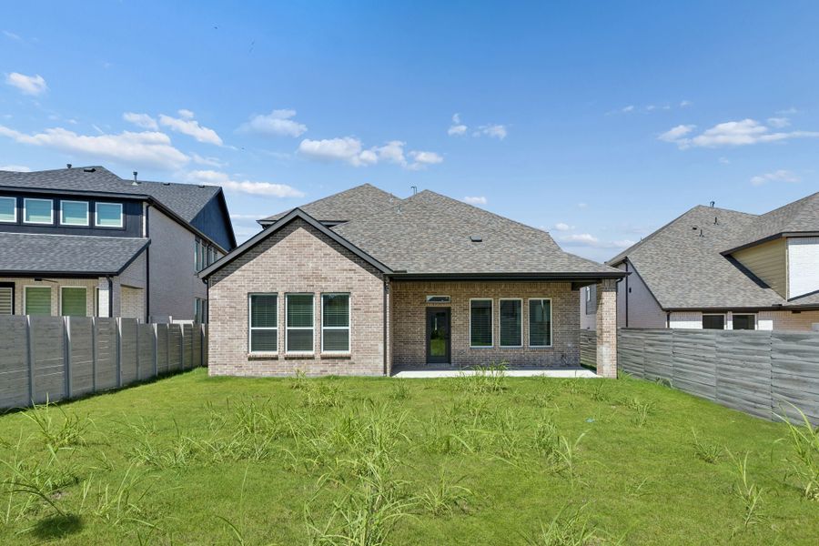 Exterior details and patio area of a home in Painted Tree Woodland West, McKinney (Image 4). Exterior details and patio area of a home in Painted Tree Woodland West, McKinney (Image 4).