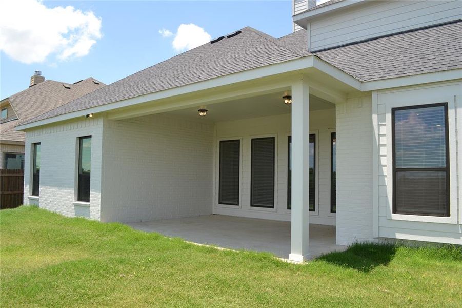 Exterior details and patio area of a home in Villages of Walnut Grove Phase 1, Midlothian (Image 2). Exterior details and patio area of a home in Villages of Walnut Grove Phase 1, Midlothian (Image 2).