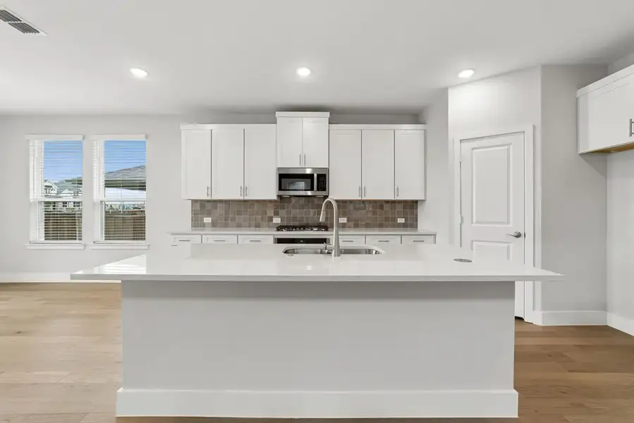 Representative furnished interior of a home built from the Harwood by Landon Homes in Lexington Frisco, Frisco (Image 8).