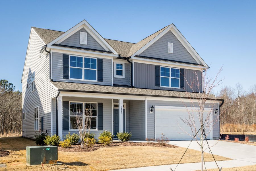 Front exterior of a new home in 1158 Place, Wilson, NC, highlighting curb appeal (Image 2). Front exterior of a new home in 1158 Place, Wilson, NC, highlighting curb appeal (Image 2).